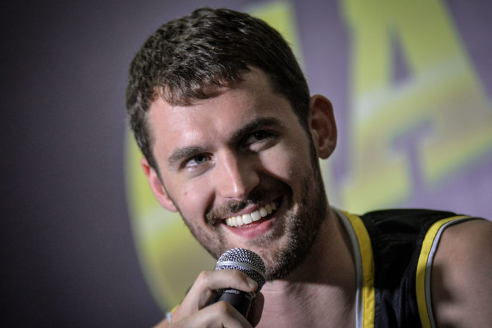 American NBA player Kevin Love answers questions from reporters during a press conference in 2014