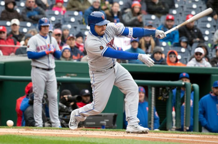Travis d'Arnaud (18) with the New York Mets