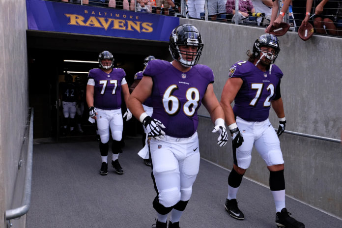 Alex Lewis with the Ravens