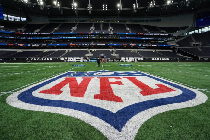 NFL Logo on field of play.