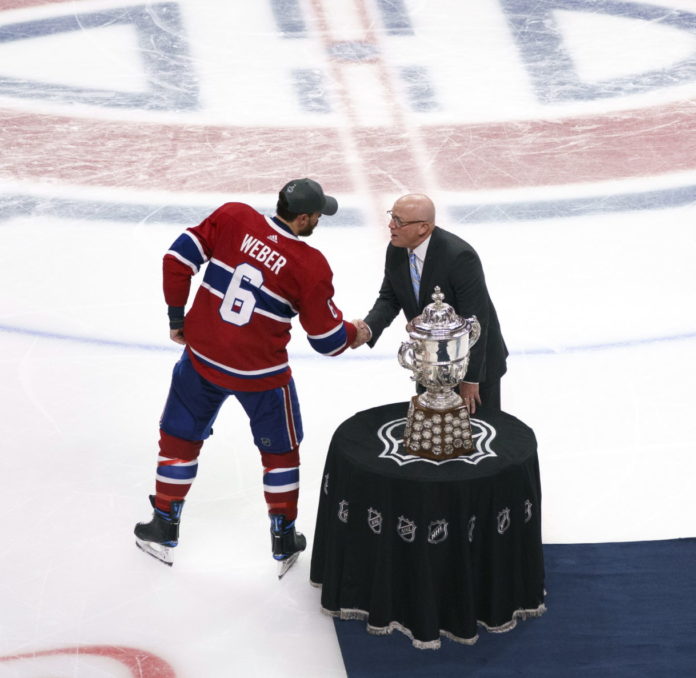 Clarence Campbell of the Montreal Canadiens and Bill Daly at the NHL Stanley Cup in 2021.