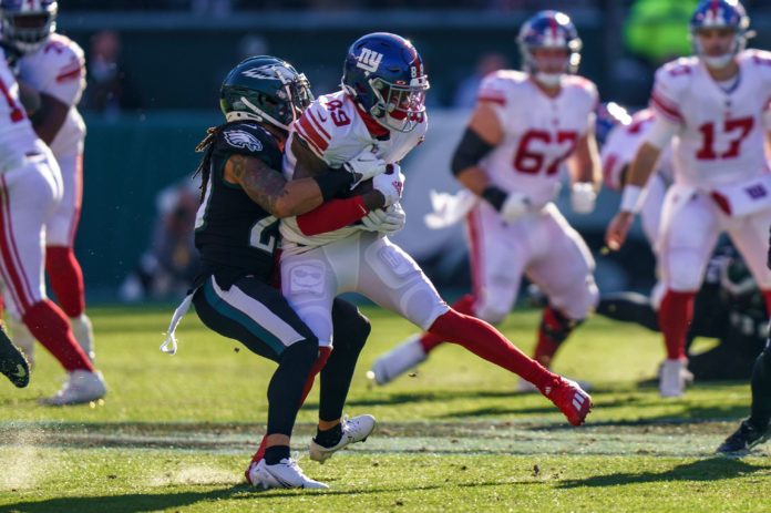 New York Giants wide receiver Kadarius Toney (89) gets tackled by Philadelphia Eagles corner Zech McPhearson (27) during a game between the New York Giants and the Philadelphia Eagles in 2021