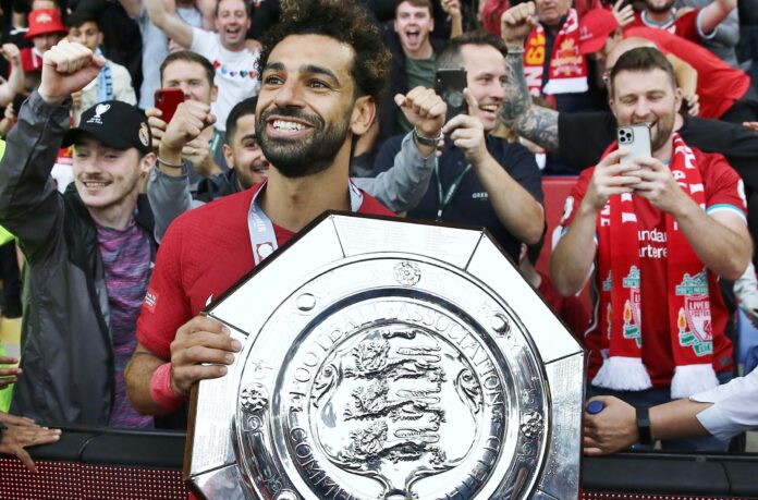 Mohamed Salah of Liverpool celebrates with the Community Shield in July 2022